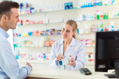 pharmacist and client at pharmacy